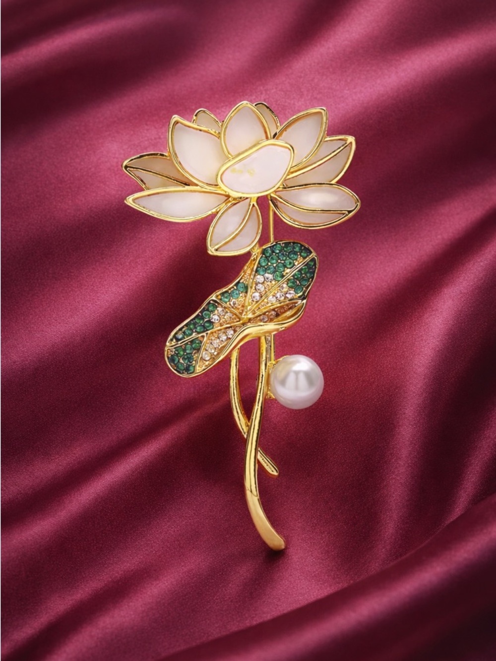 Golden Lotus Pearl Brooch – Elegant Floral Pin with Green Crystal Leaf